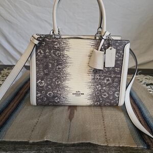 Coach Zoe Carryall in lizard-embossed leather, specifically in the Chalk/Silver